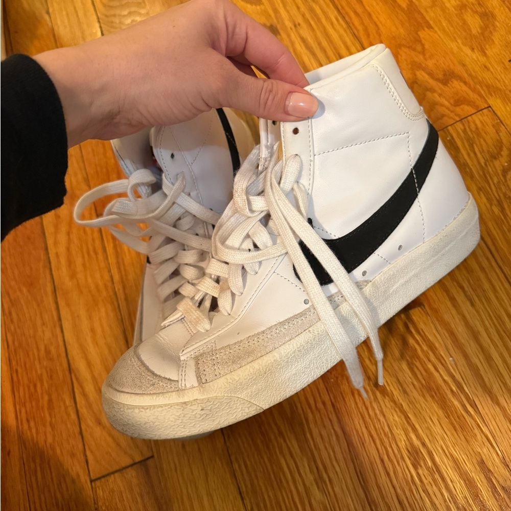 Nike White High-Top Sneakers with Black Stripe